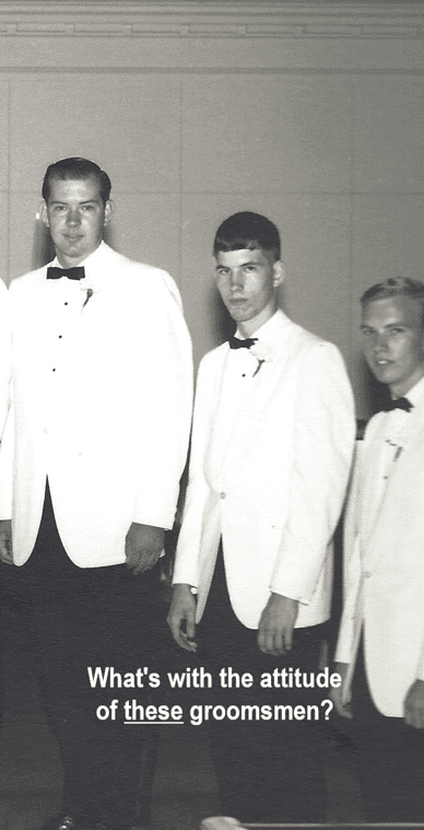 A group of men in tuxedos posing for the camera.